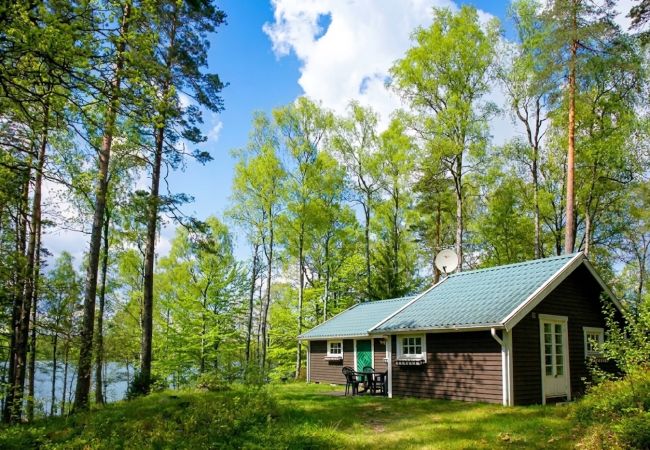 Ferienhaus in Röke - Urlaub an einem Waldsee in Skåne mit Boot