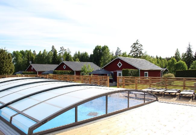 Ferienhaus in Väckelsång - Traumurlaub am See mit Boot und Pool vor der Tür Ferienhaus in Väckelsång - Traumurlaub am See mit Boot und Pool vor der Tür