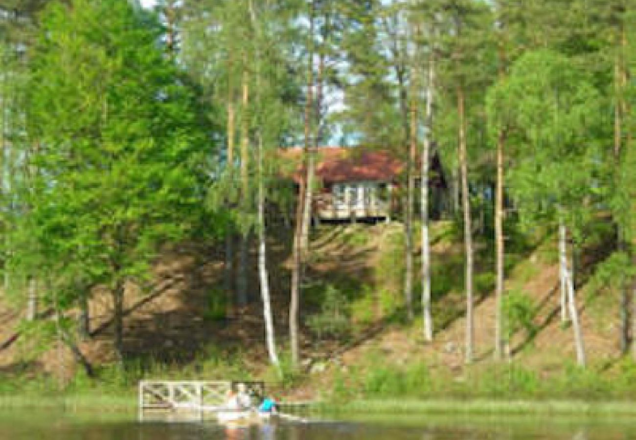 Ferienhaus in Bjärnum - 2 Ferienhäuser mit Sauna und Whirlpool direkt am See