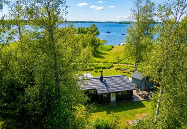 House in Köping - Cozy holiday home by the lake with its own boat