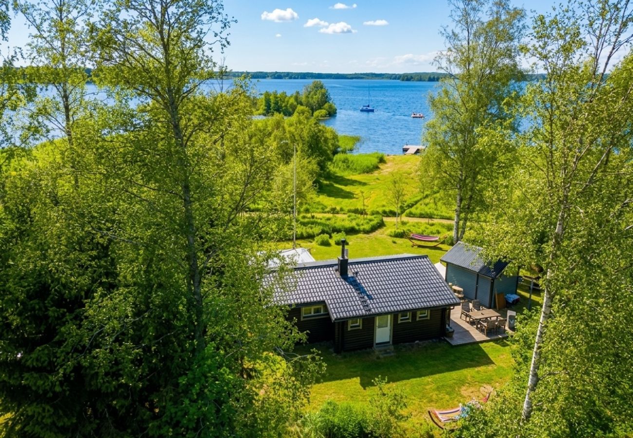 House in Köping - Cozy holiday home by the lake with its own boat