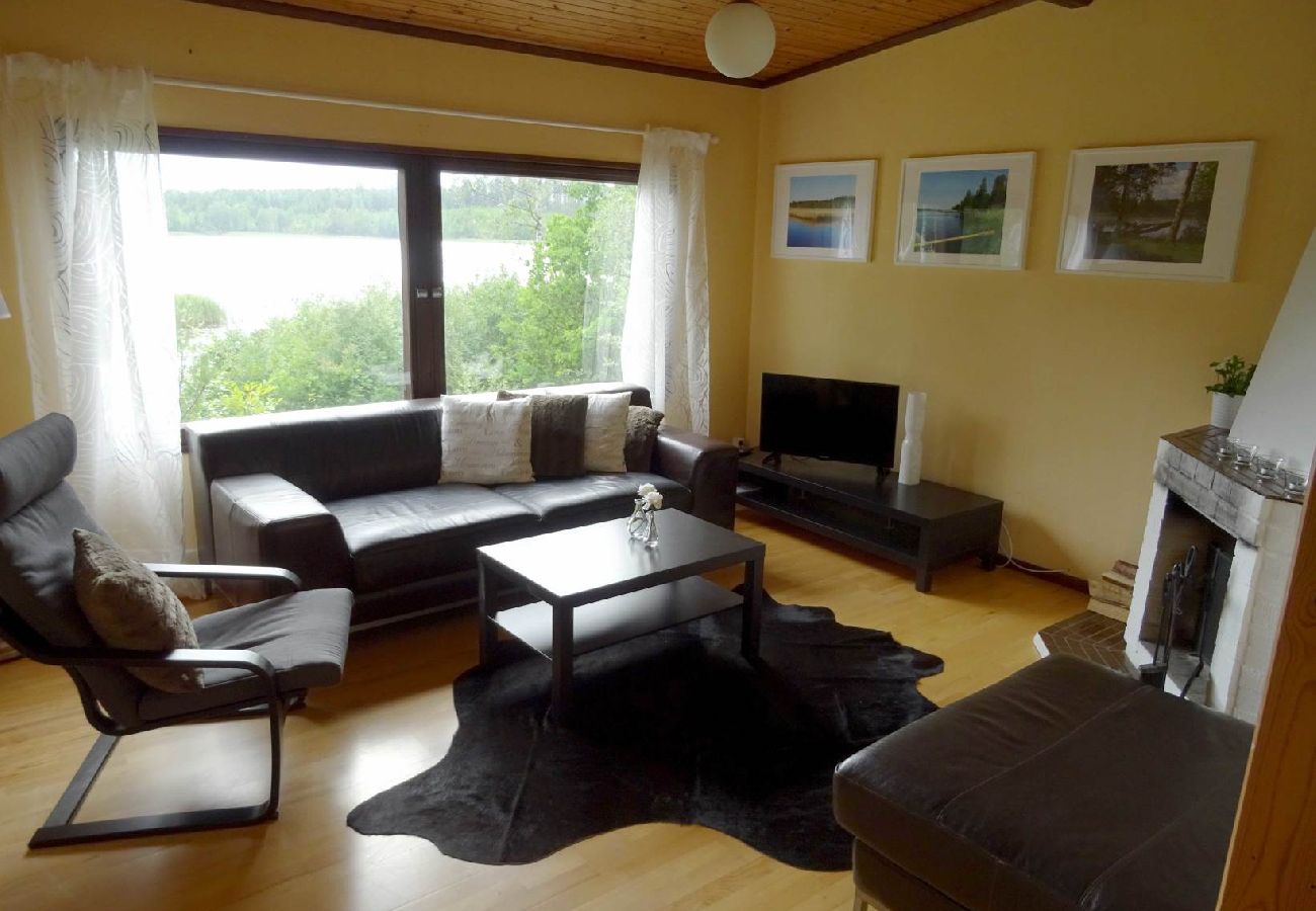 House in Hultsfred - Holiday home directly on the lake with private boat at the jetty, swimming raft and sauna