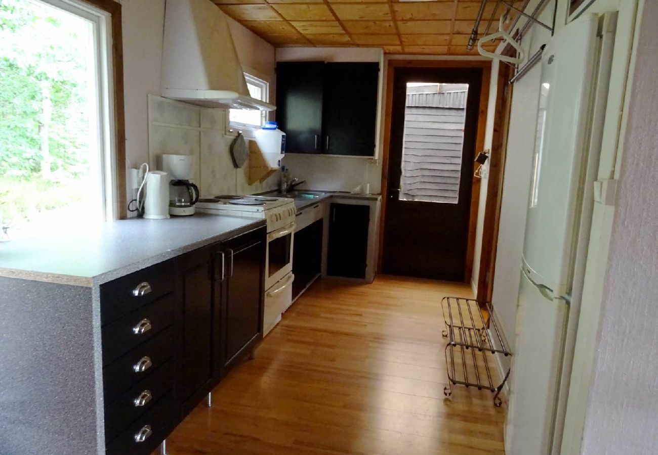House in Hultsfred - Holiday home directly on the lake with private boat at the jetty, swimming raft and sauna