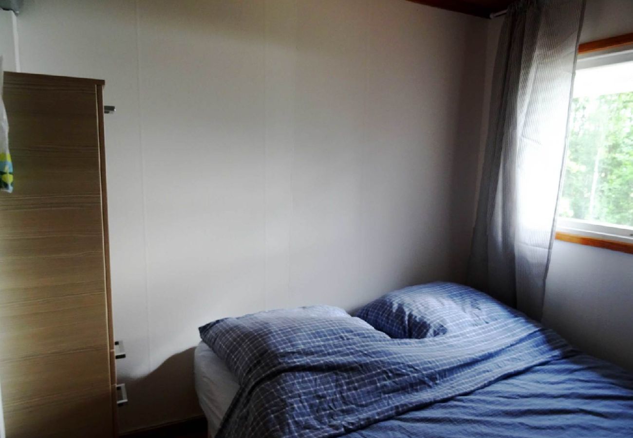 House in Hultsfred - Holiday home directly on the lake with private boat at the jetty, swimming raft and sauna