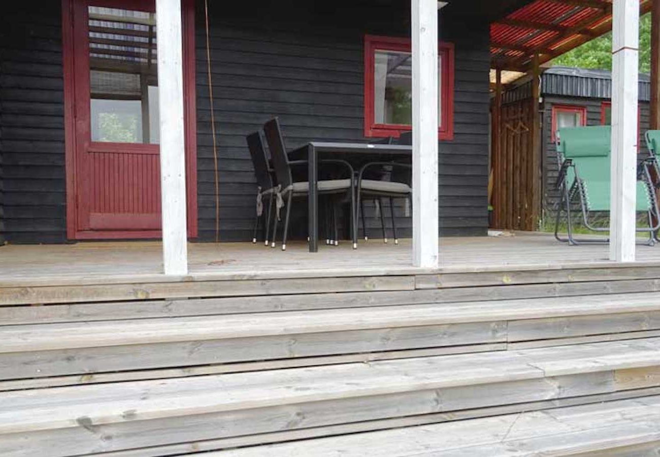 House in Hultsfred - Holiday home directly on the lake with private boat at the jetty, swimming raft and sauna