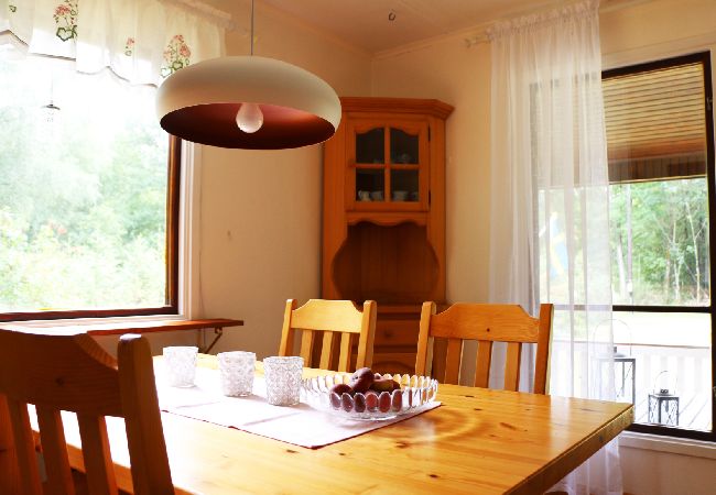 House in Annerstad - Red and white holiday cottage on Lake Kösen with boat