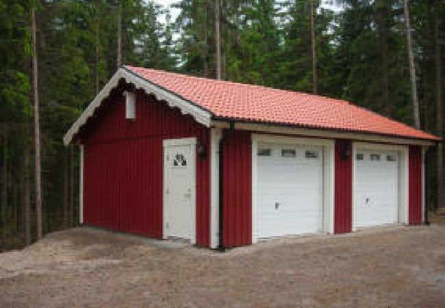 House in Bjärnum - 2 holiday homes with sauna and whirlpool directly on the lake