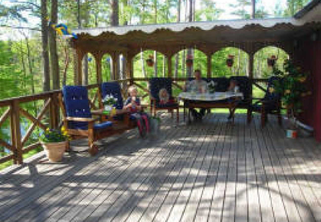 House in Bjärnum - 2 holiday homes with sauna and whirlpool directly on the lake
