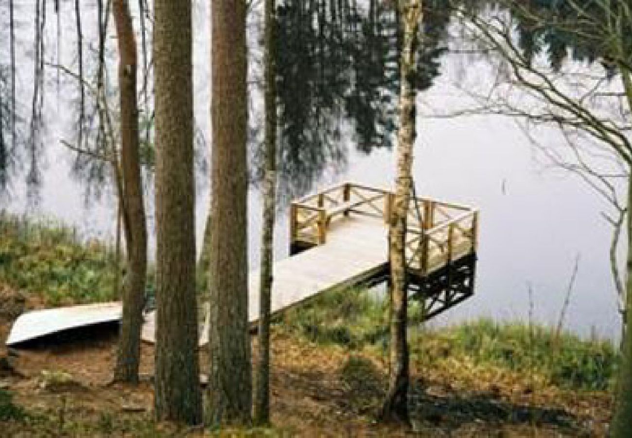 House in Bjärnum - 2 holiday homes with sauna and whirlpool directly on the lake