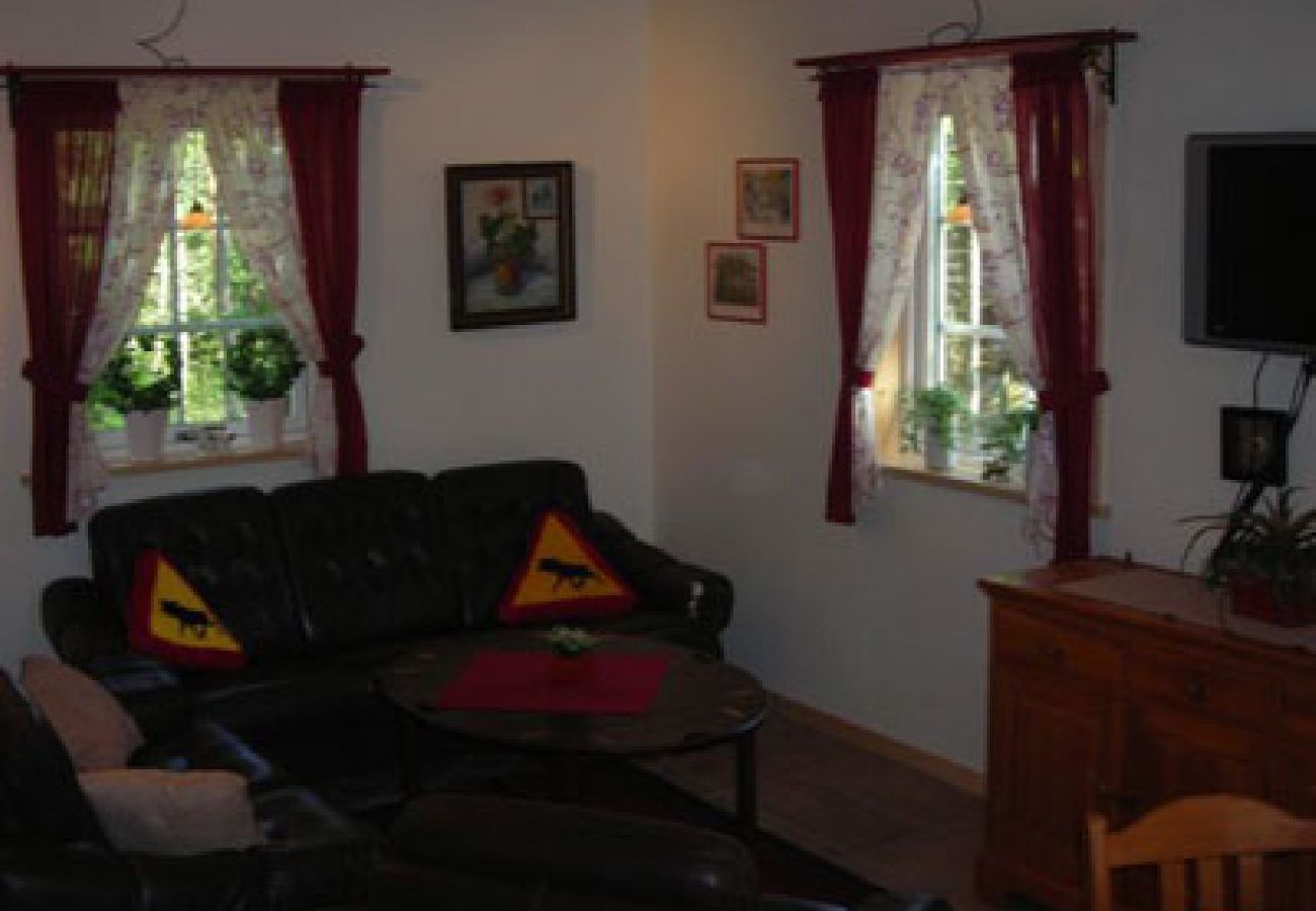 House in Bjärnum - 2 holiday homes with sauna and whirlpool directly on the lake