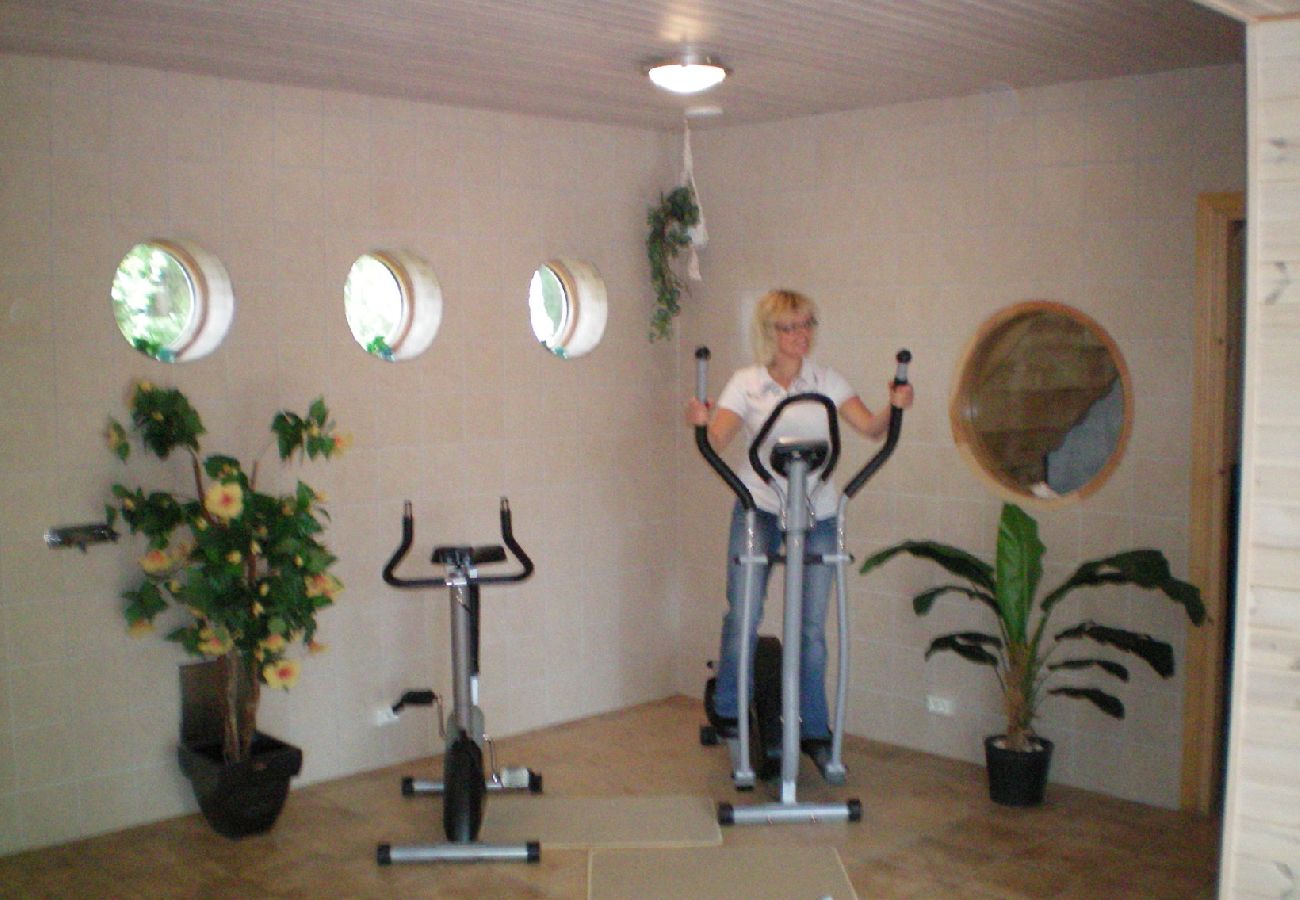 House in Bjärnum - 2 holiday homes with sauna and whirlpool directly on the lake