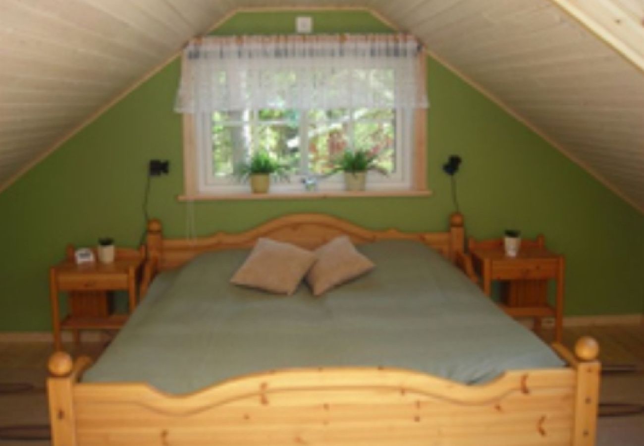 House in Bjärnum - 2 holiday homes with sauna and whirlpool directly on the lake