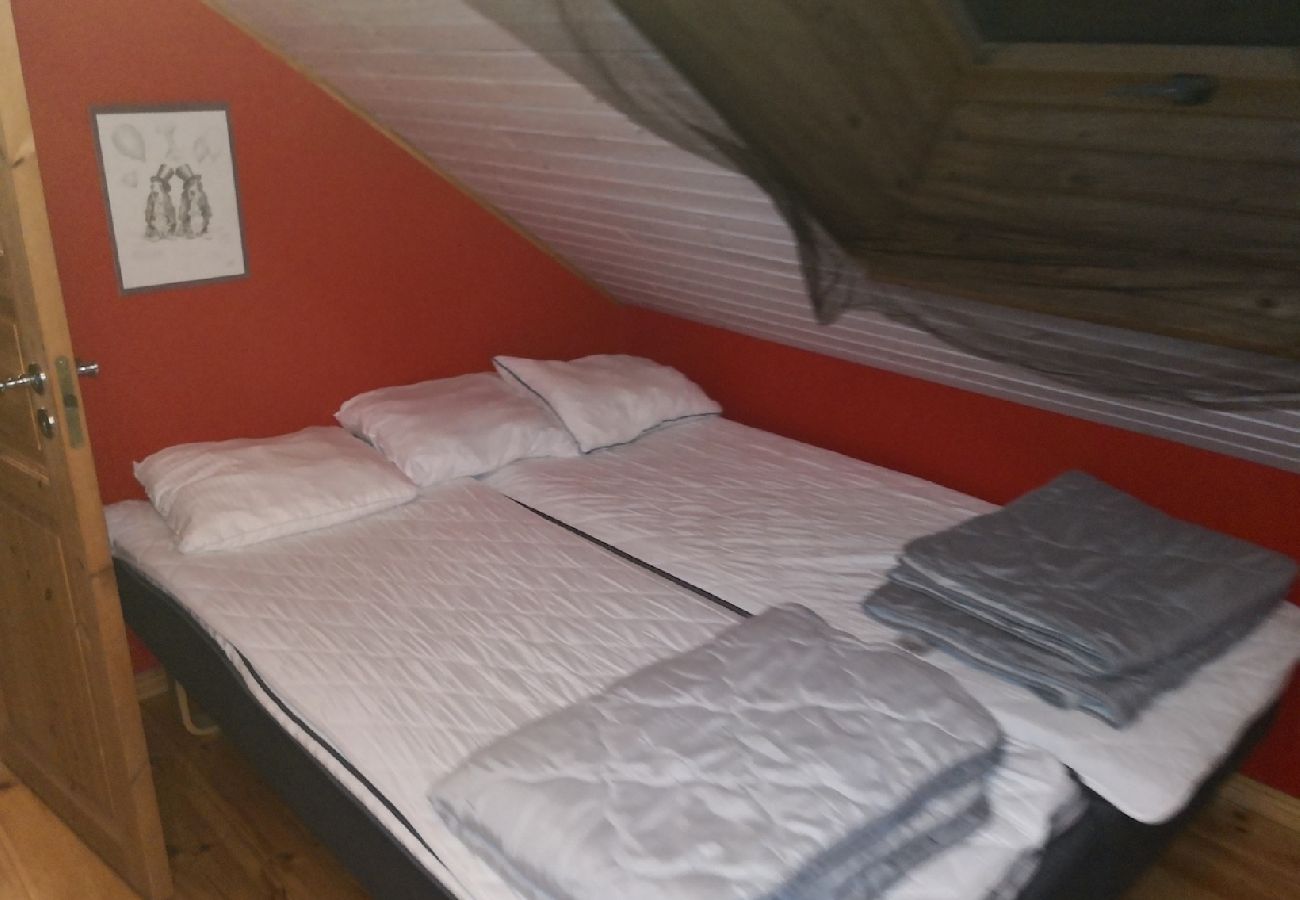 House in Bjärnum - 2 holiday homes with sauna and whirlpool directly on the lake