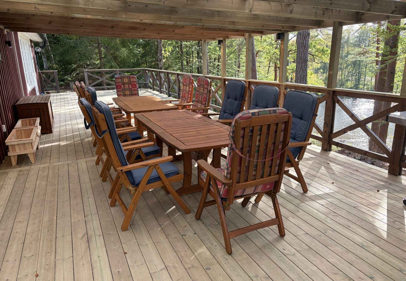 House in Bjärnum - 2 holiday homes with sauna and whirlpool directly on the lake