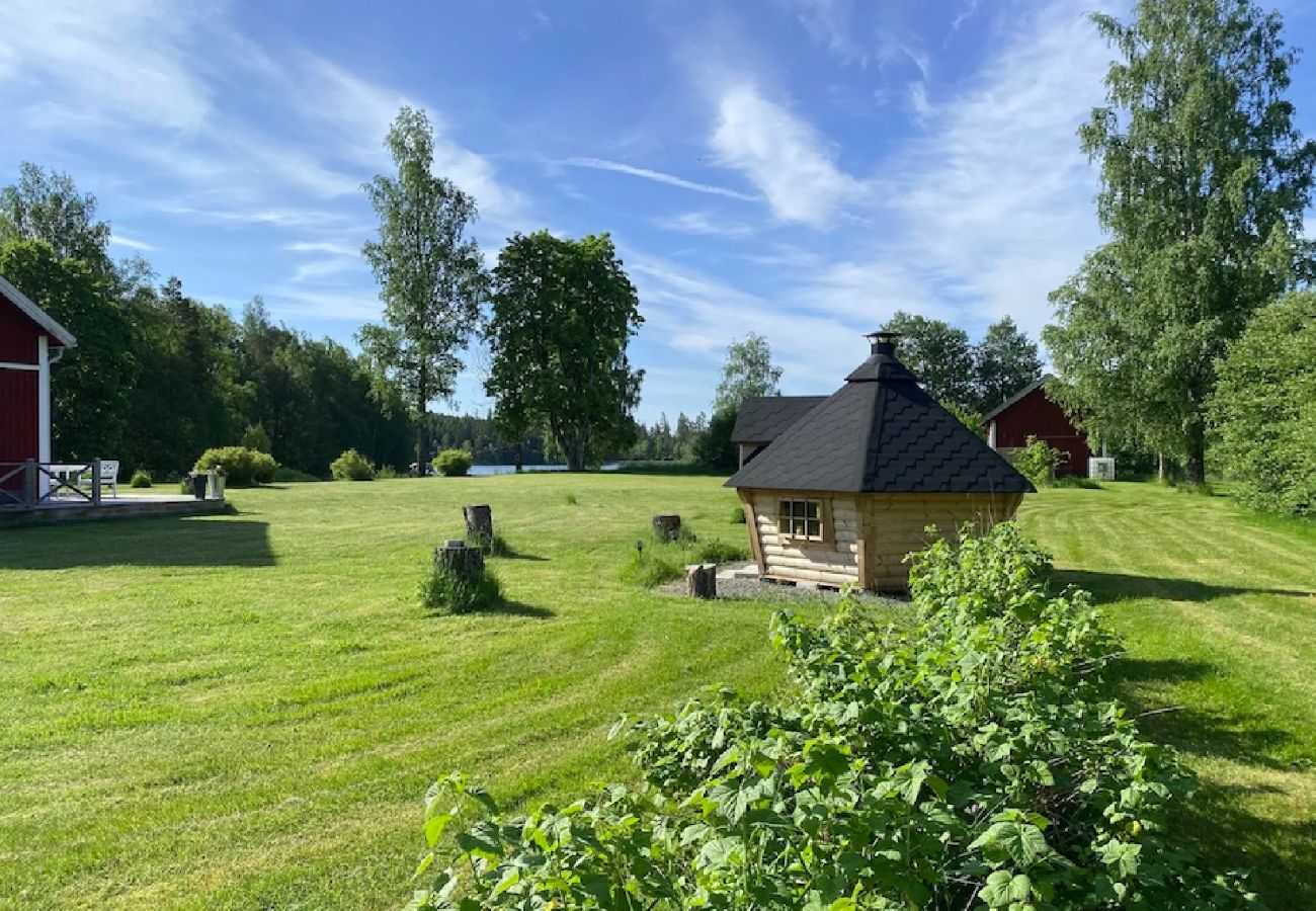 House in Stockaryd - Holiday paradise on the lake with a boat and sauna