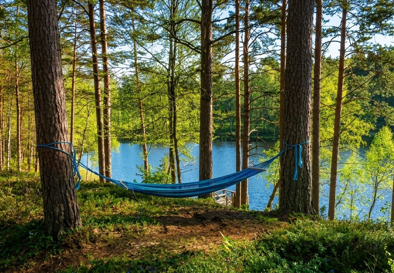 Stuga i Bjärnum - 2 stugor med bastu och bubbelpool direkt vid sjön
